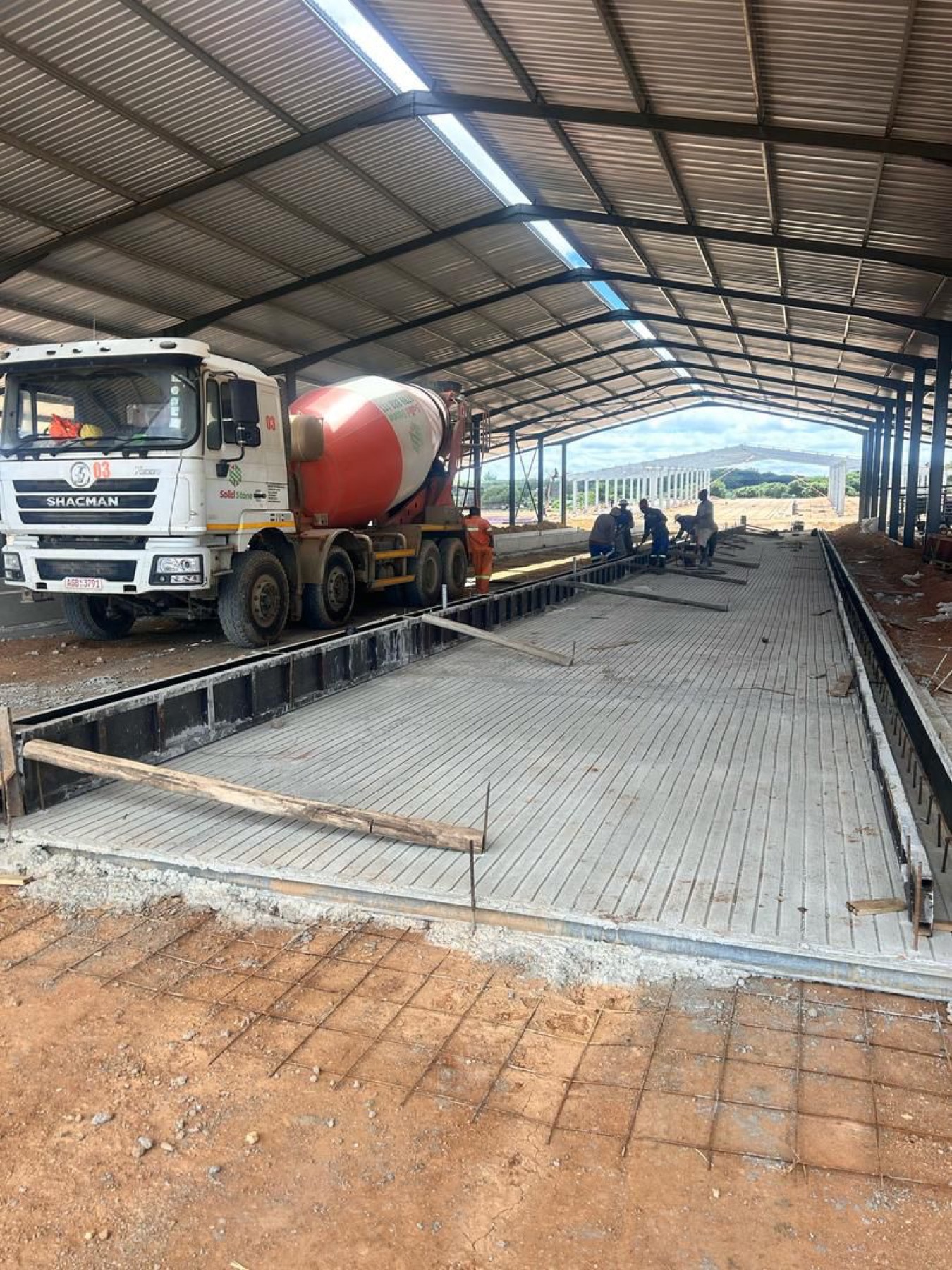 Concrete pour under the shed roof